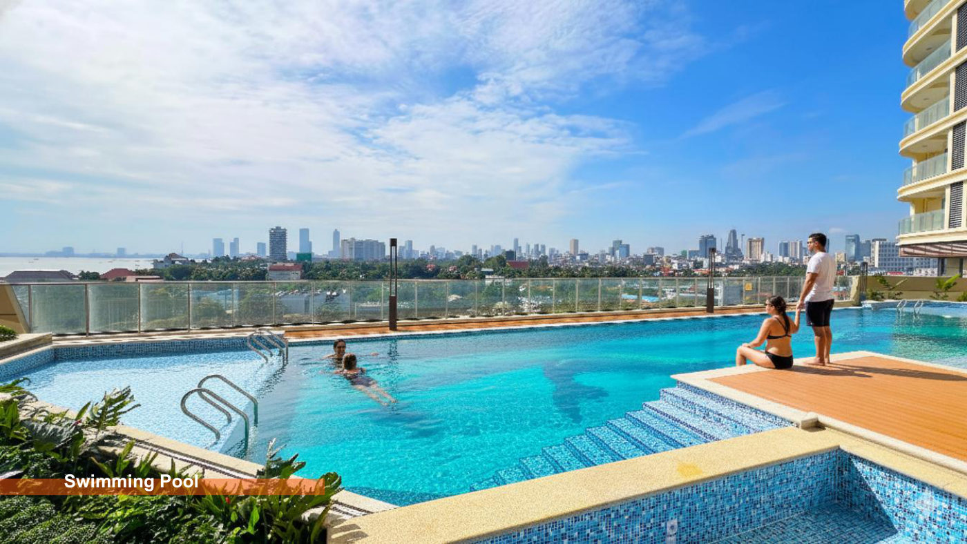 Swimming pool with city skyline view